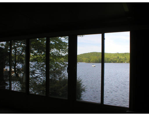 174 Manchaug Road Sutton, MA 01590 - Photo 3 of 7 a picture of a floor