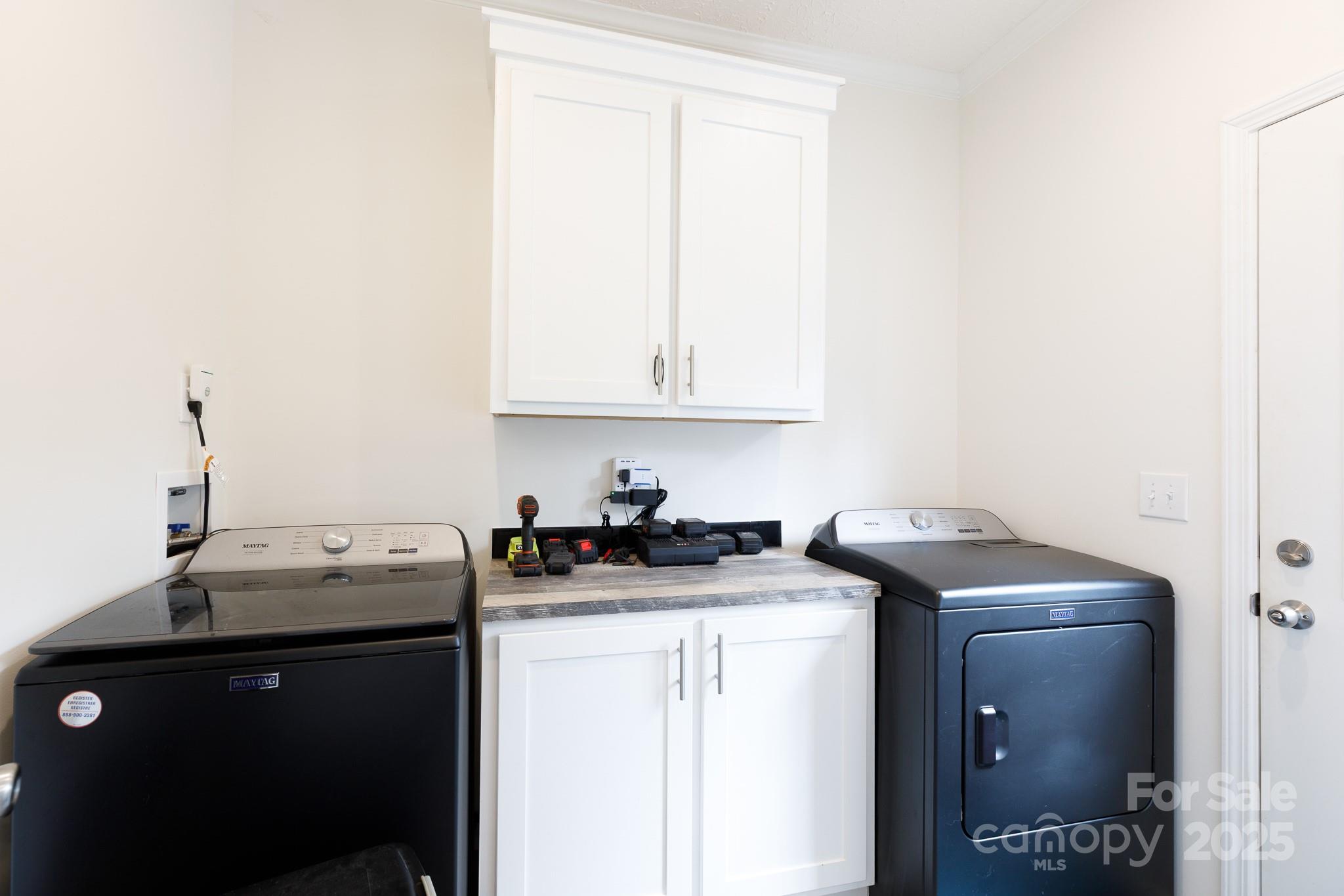 4575 Cureton Ferry Road Catawba, SC 29704 - Photo 17 of 42 a utility room with sink dryer and washer