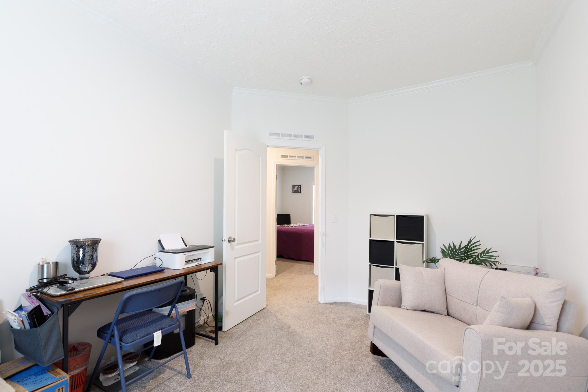4575 Cureton Ferry Road Catawba, SC 29704 - Photo 24 of 42 a living room with furniture and a lamp