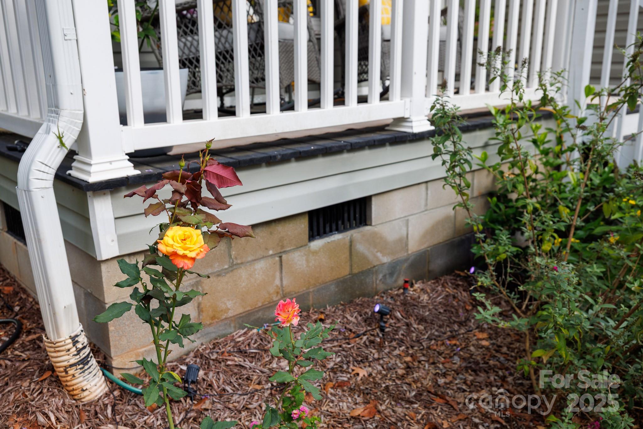 4575 Cureton Ferry Road Catawba, SC 29704 - Photo 31 of 42 a view of a house with a flower garden