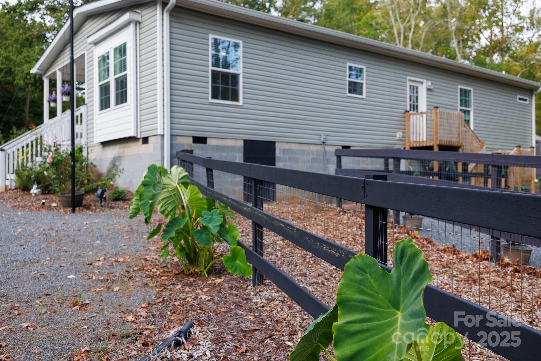 4575 Cureton Ferry Road Catawba, SC 29704 - Photo 33 of 42 a view of a house with backyard and sitting area