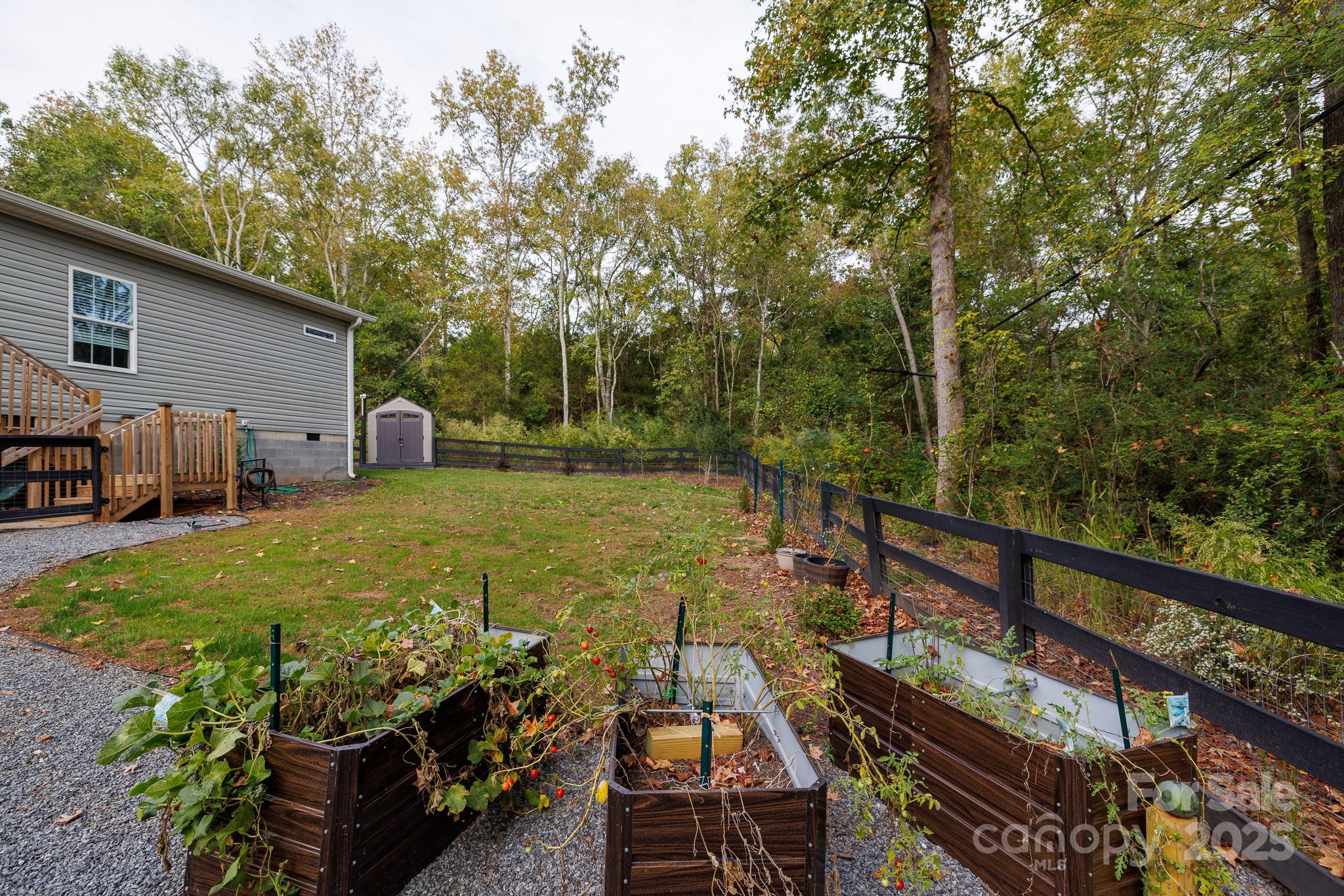 4575 Cureton Ferry Road Catawba, SC 29704 - Photo 39 of 42 a view of a backyard with sitting area