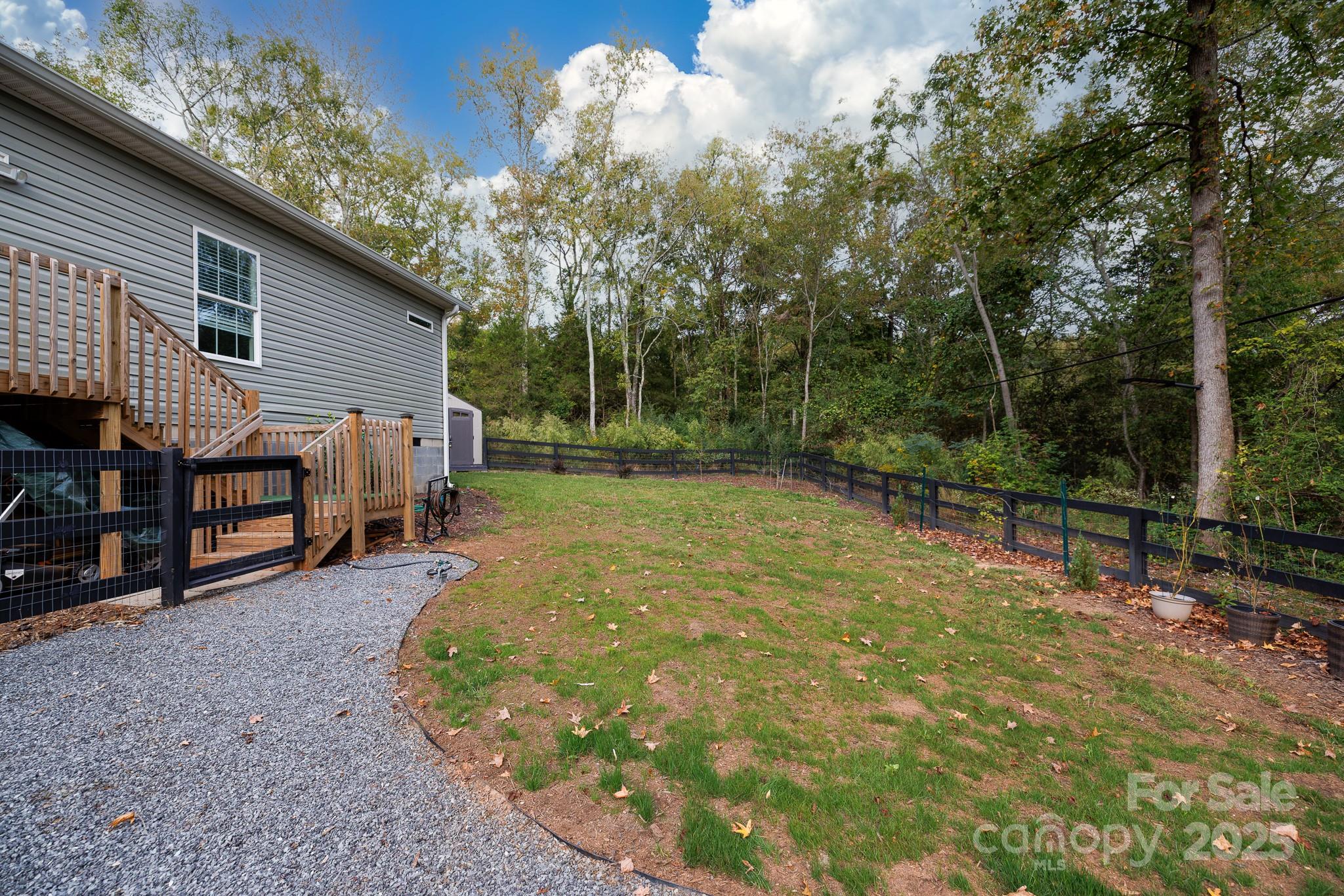 4575 Cureton Ferry Road Catawba, SC 29704 - Photo 42 of 42 a backyard of a house with barbeque oven and outdoor seating