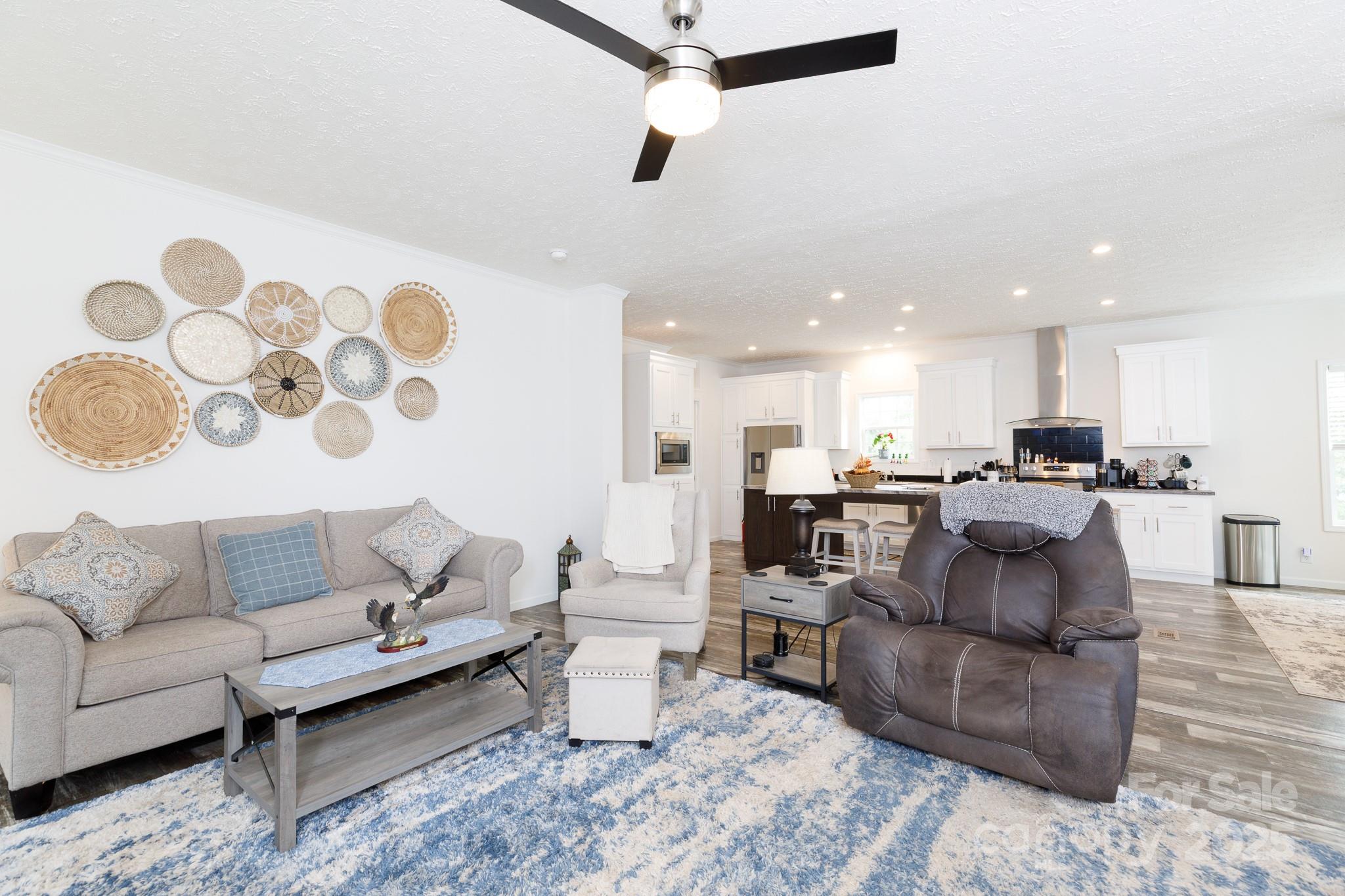 4575 Cureton Ferry Road Catawba, SC 29704 - Photo 8 of 42 a living room with furniture and kitchen view