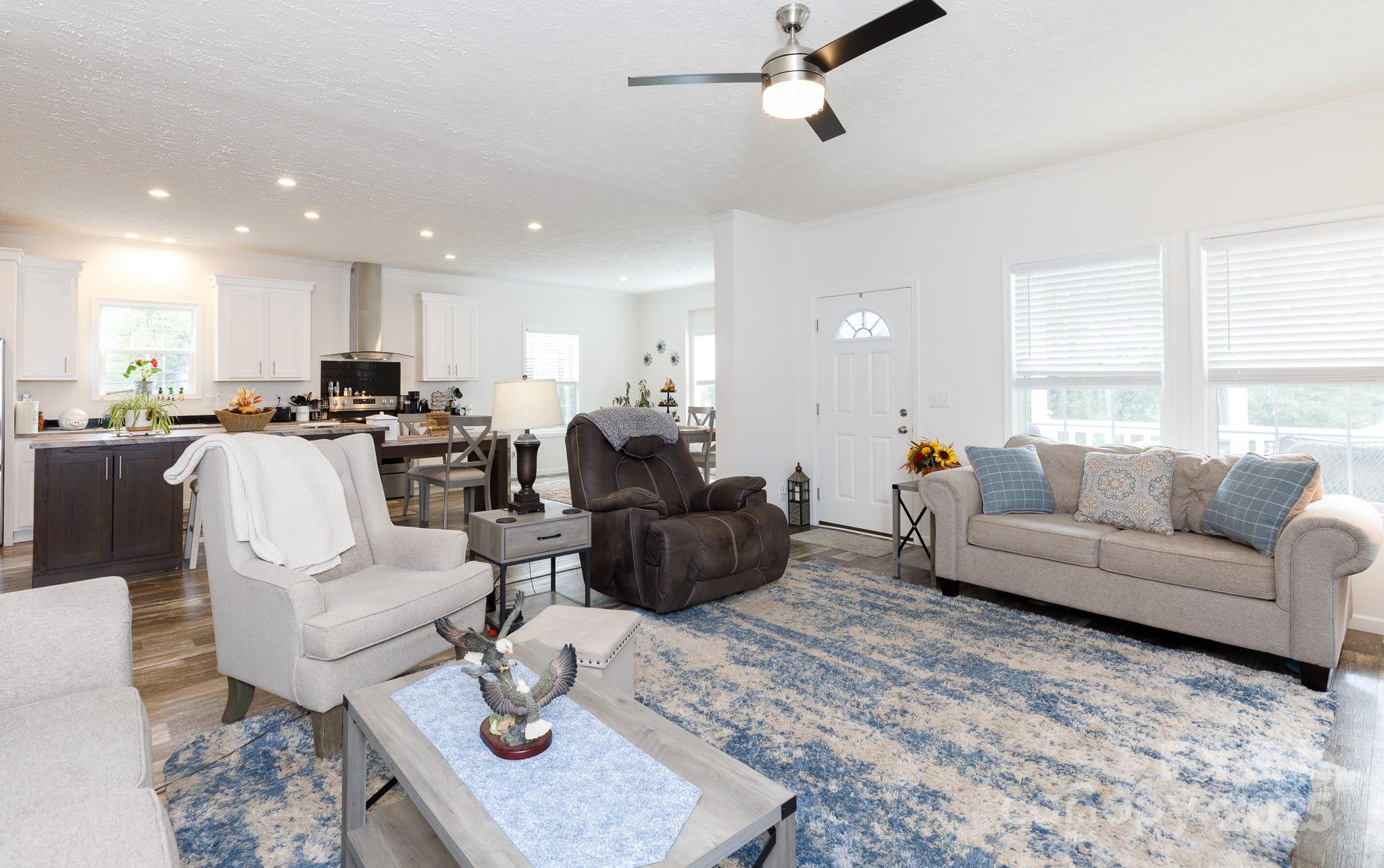 4575 Cureton Ferry Road Catawba, SC 29704 - Photo 10 of 42 a living room with furniture kitchen view and a window