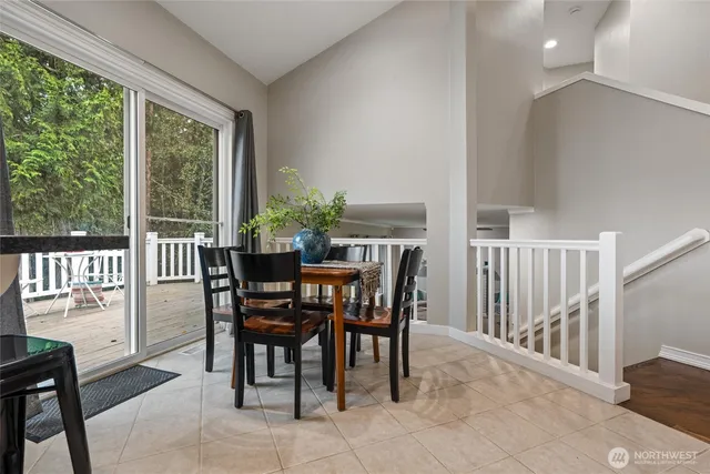 a view of a dining room with furniture window and outside view