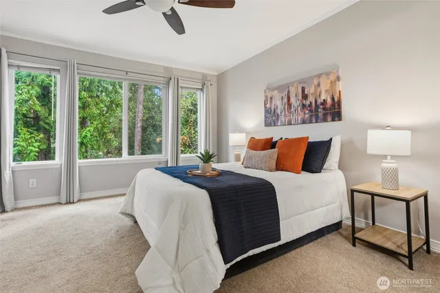 a bedroom with a bed and window