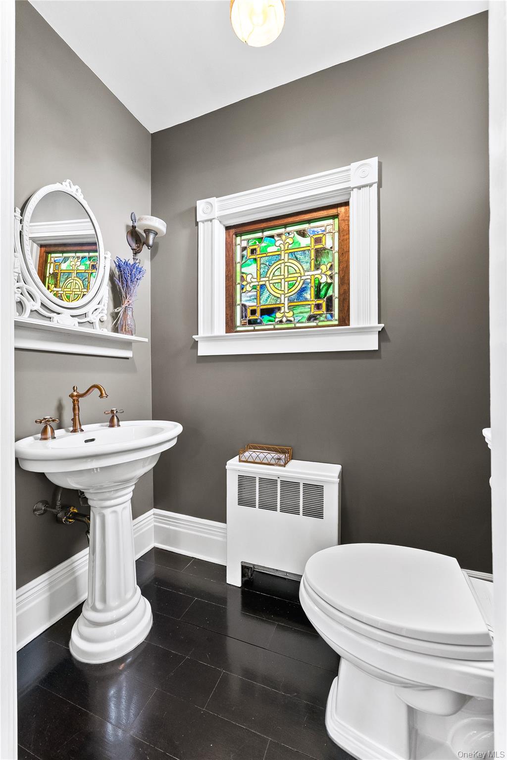 19 Howe Place Bronxville, NY 10708 - Photo 11 of 37 Half bathroom right outside formal dining area and kitchen.