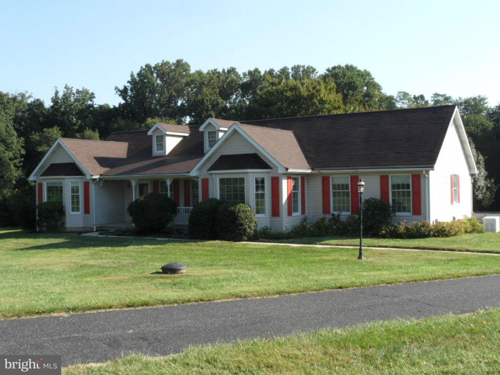 1709 Oakmont Road Fallston, MD 21047 - Photo 1 of 30 a front view of a house with a yard