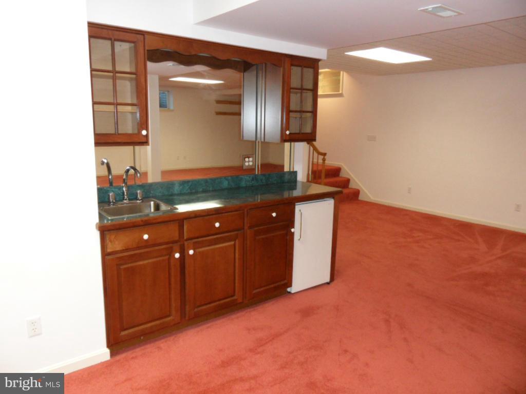 1709 Oakmont Road Fallston, MD 21047 - Photo 17 of 30 a bathroom with a sink and a mirror