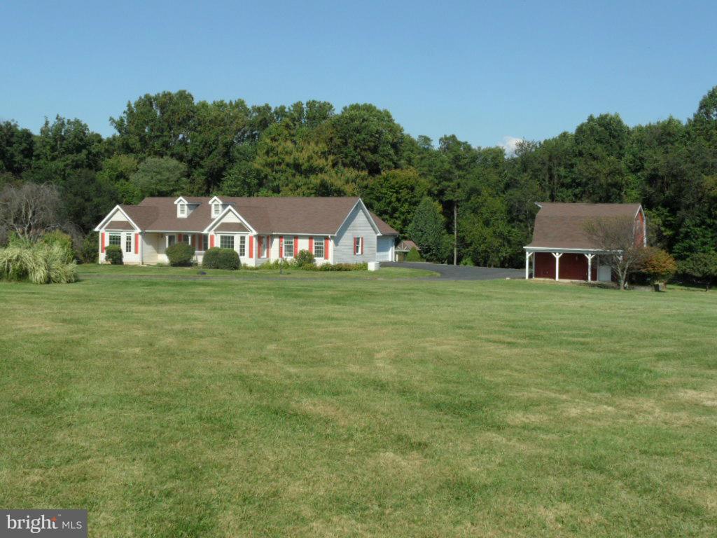 1709 Oakmont Road Fallston, MD 21047 - Photo 3 of 30 a front view of a house with a yard