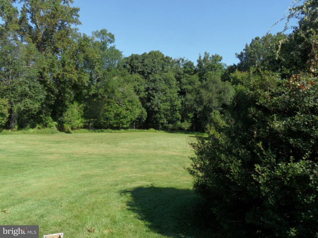 1709 Oakmont Road Fallston, MD 21047 - Photo 23 of 30 a view of a field with trees in the background