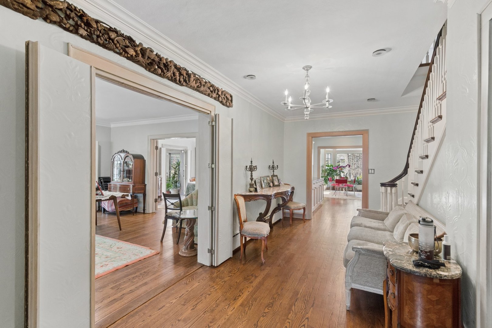 321 Woodland Road Highland Park, IL 60035 - Photo 19 of 48 a view of a livingroom with furniture hardwood floor and staircase
