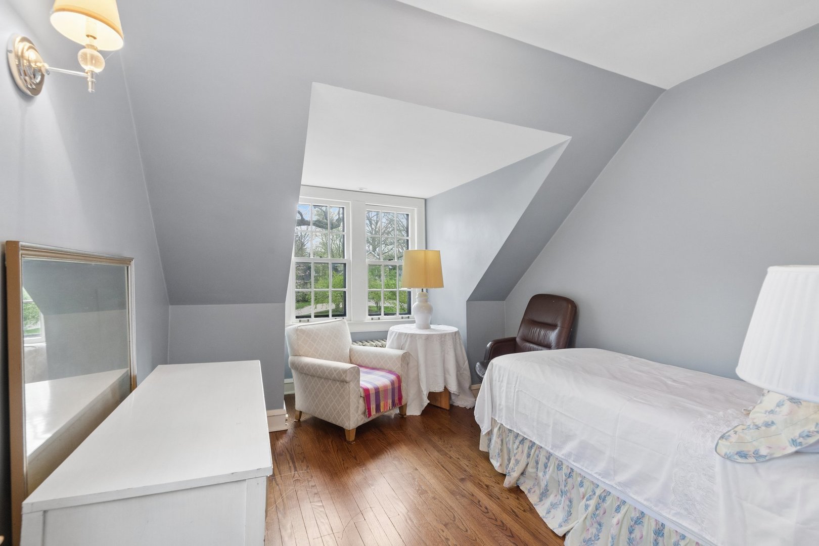 321 Woodland Road Highland Park, IL 60035 - Photo 38 of 48 a bedroom with a bed and a large window