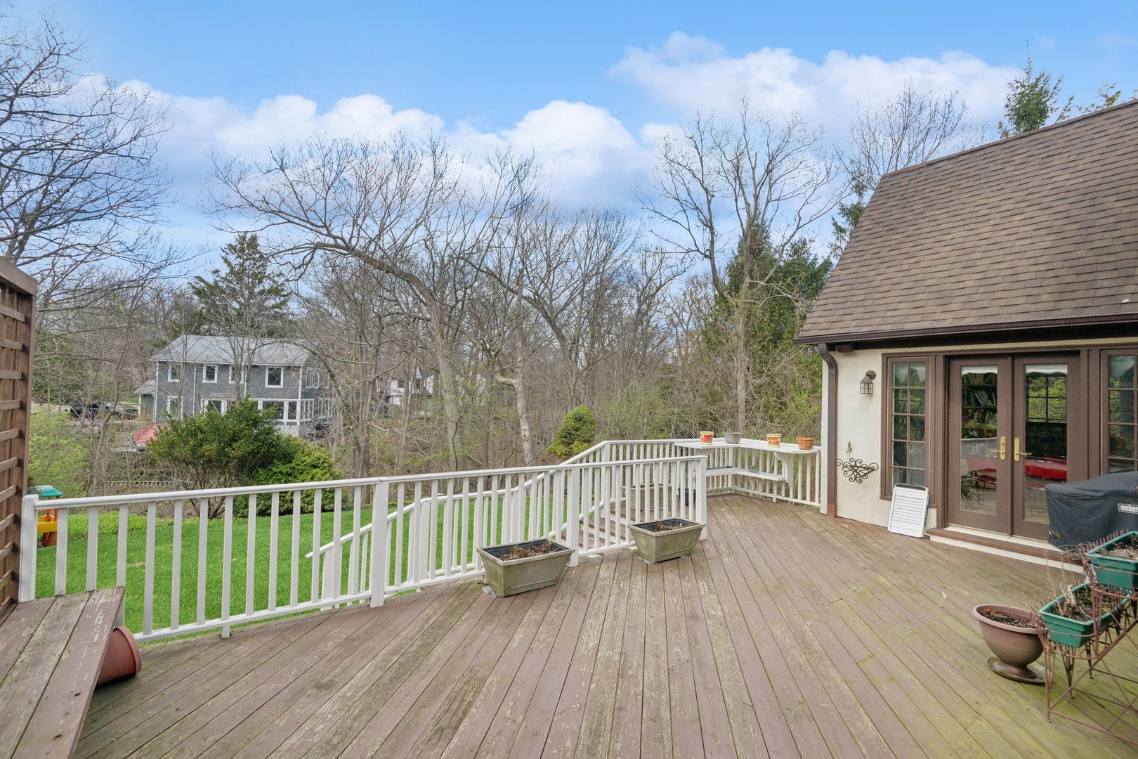 321 Woodland Road Highland Park, IL 60035 - Photo 42 of 48 a view of a house with wooden deck