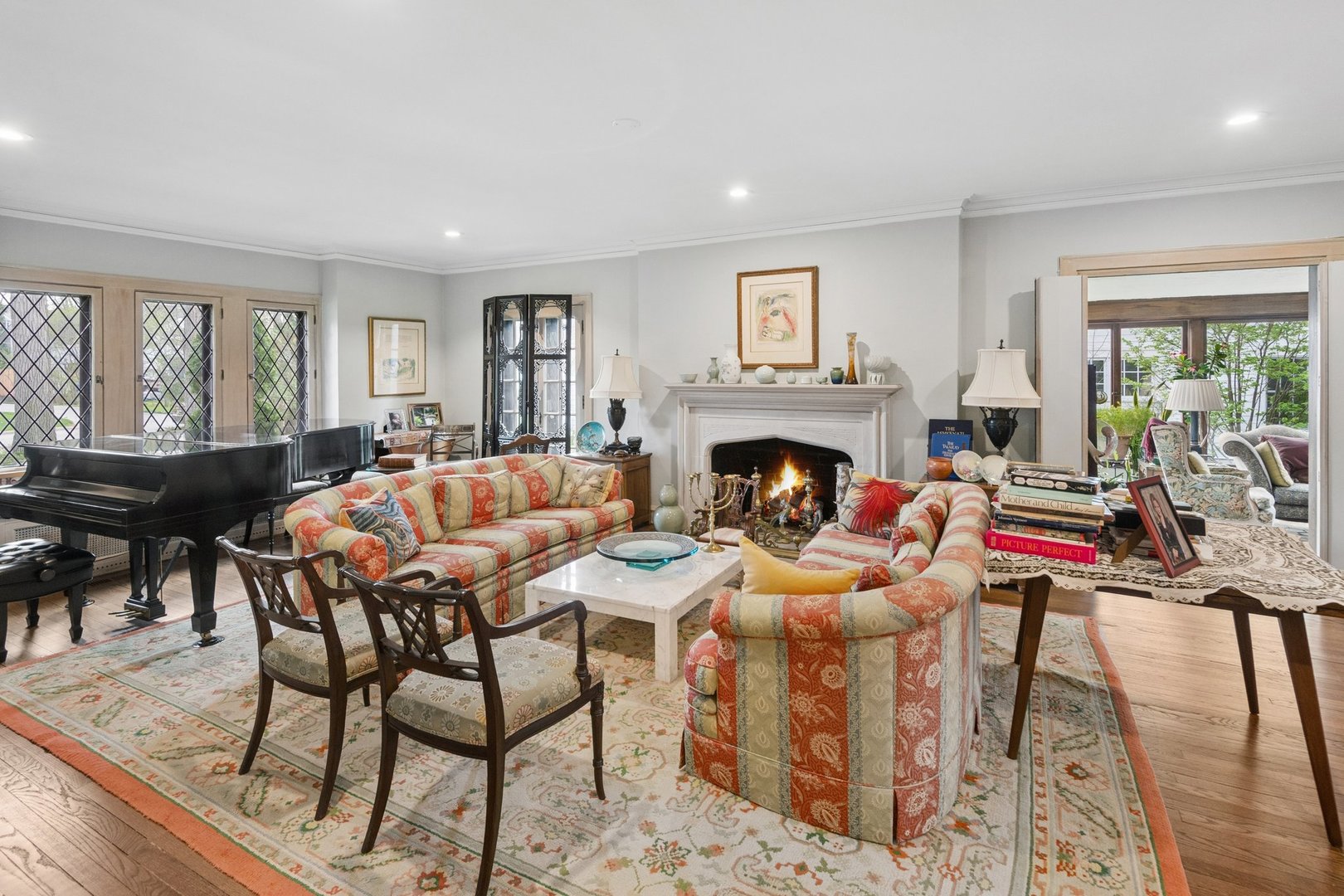 321 Woodland Road Highland Park, IL 60035 - Photo 5 of 48 a living room with furniture fireplace and a table