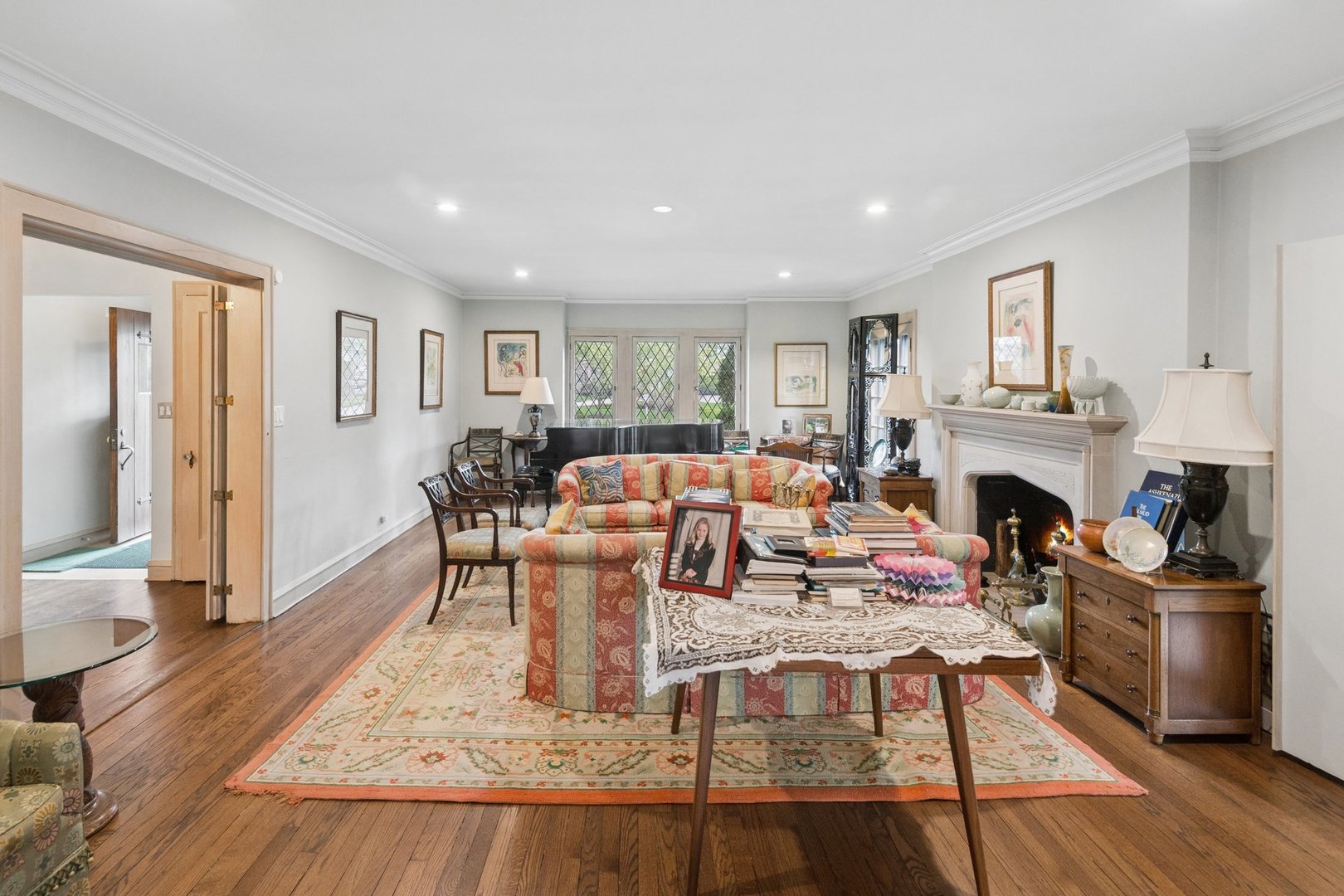 321 Woodland Road Highland Park, IL 60035 - Photo 6 of 48 a living room with fireplace furniture and a wooden floor