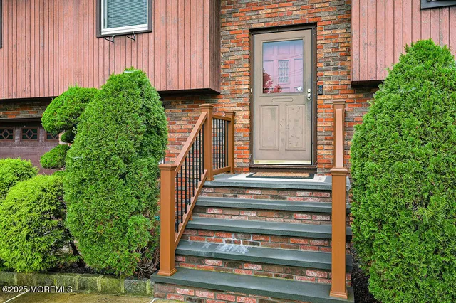 a view of a house with a window and stairs