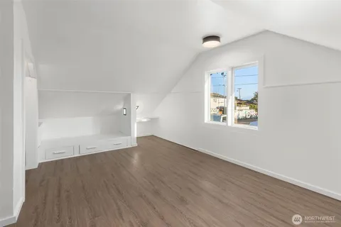 a bathroom with a sink a mirror and a bathtub