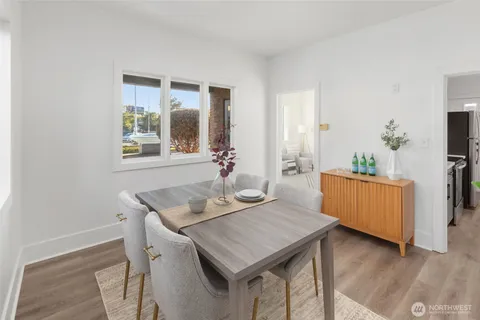 a kitchen with a refrigerator stove and sink