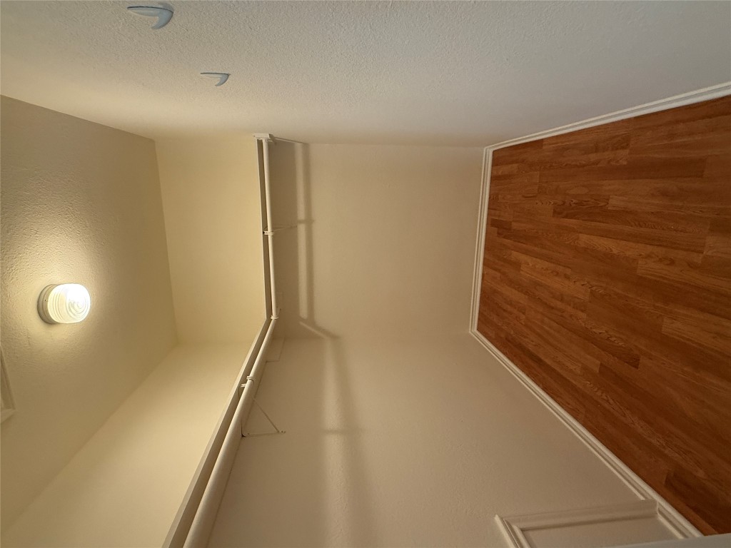 314 Raintree Drive Georgetown, TX 78626 - Photo 6 of 13 a view of a room with wooden floor