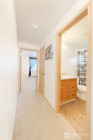 a bathroom with a toilet a sink and bathtub