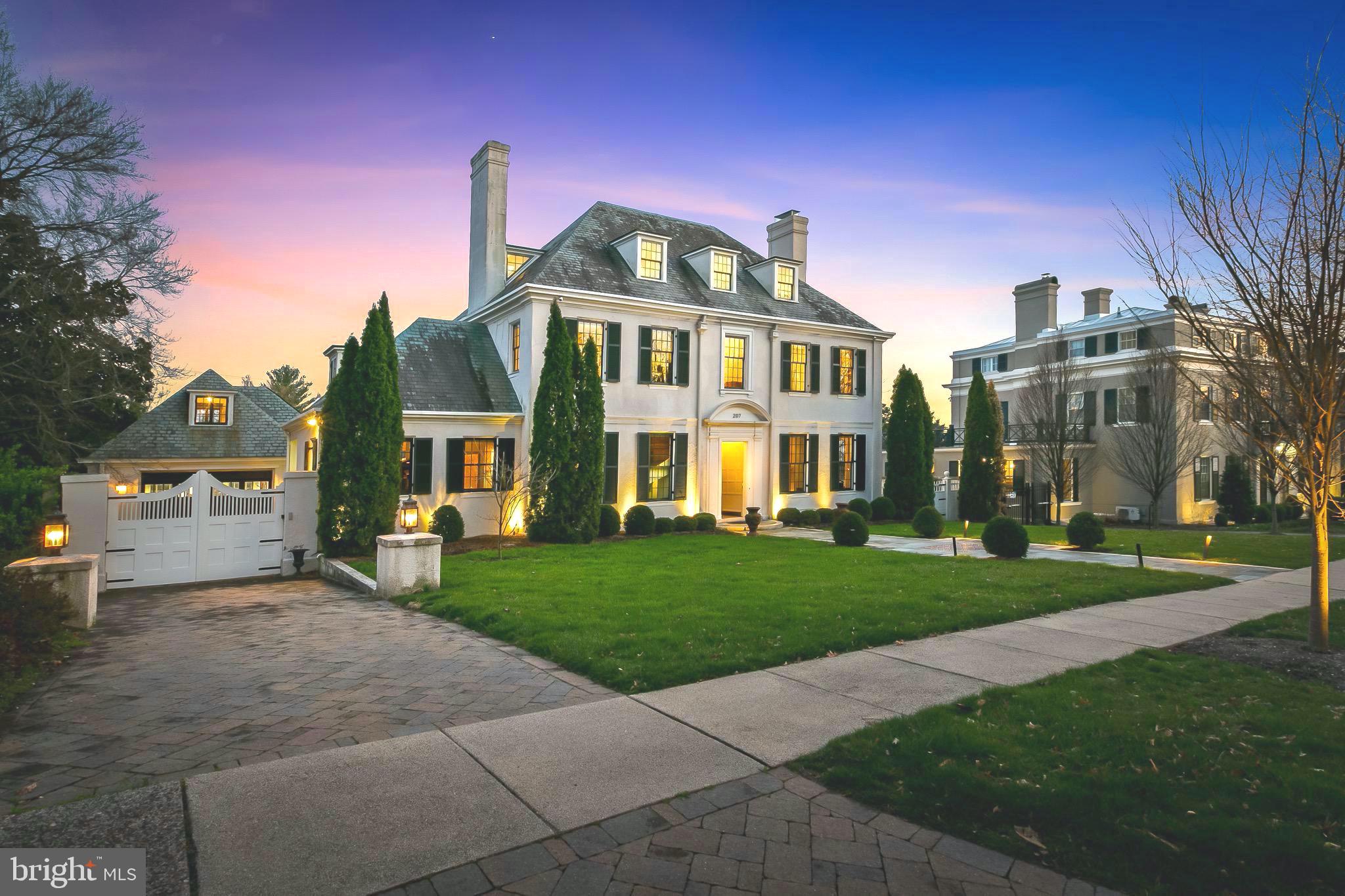 View of home and gated garage from Wendover Road