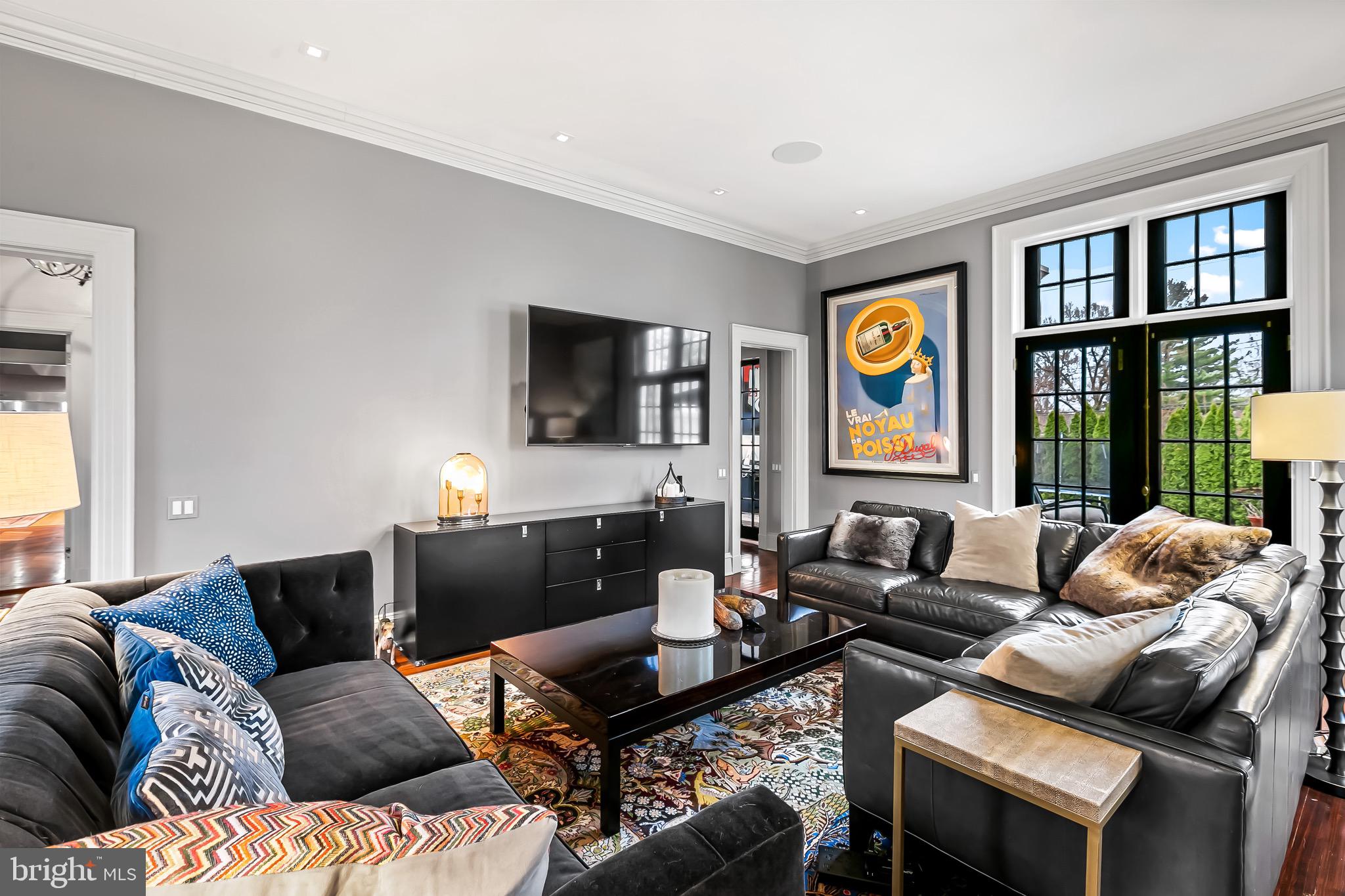 207 Wendover Road Baltimore, MD 21218 - Photo 17 of 111 Living room with French doors to Bluestone patio