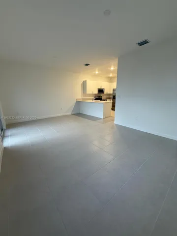 a view of a livingroom with a sink