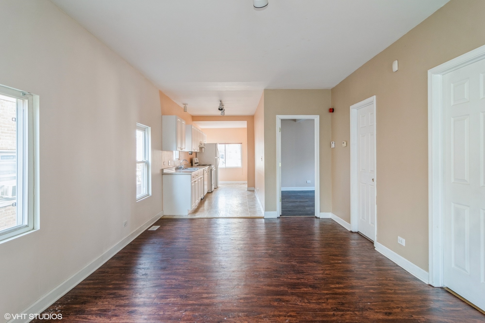 905 Thomas Avenue, Unit 1 Forest Park, IL 60130 - Photo 2 of 15 a view of a hallway with wooden floor