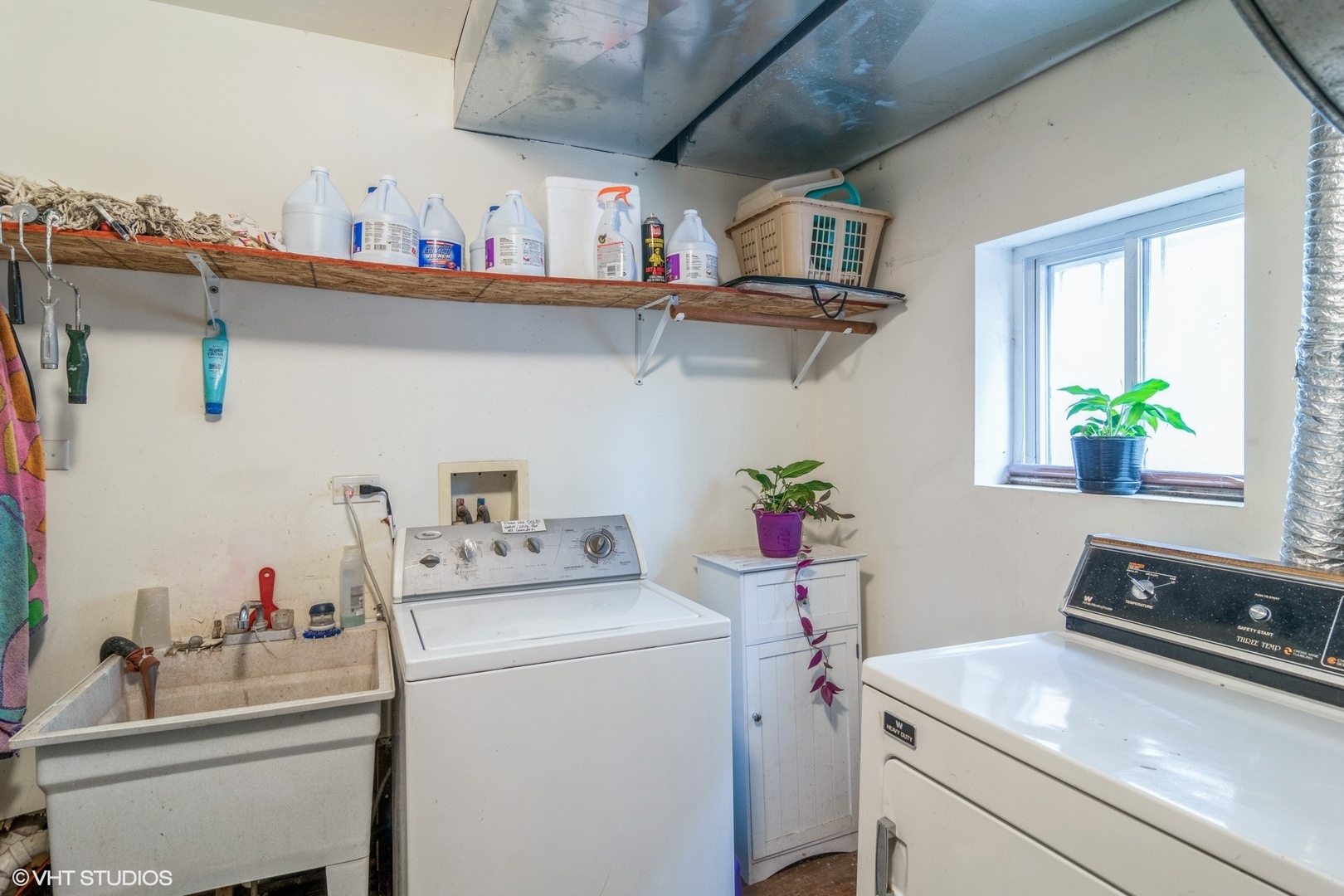 905 Thomas Avenue, Unit 1 Forest Park, IL 60130 - Photo 13 of 15 a room with storage and utility