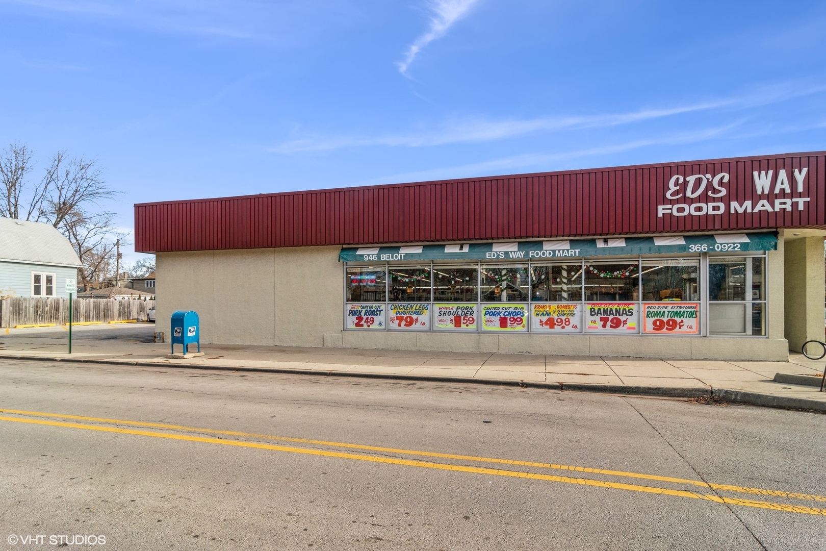 905 Thomas Avenue, Unit 1 Forest Park, IL 60130 - Photo 14 of 15 a front view of a building with retail shops