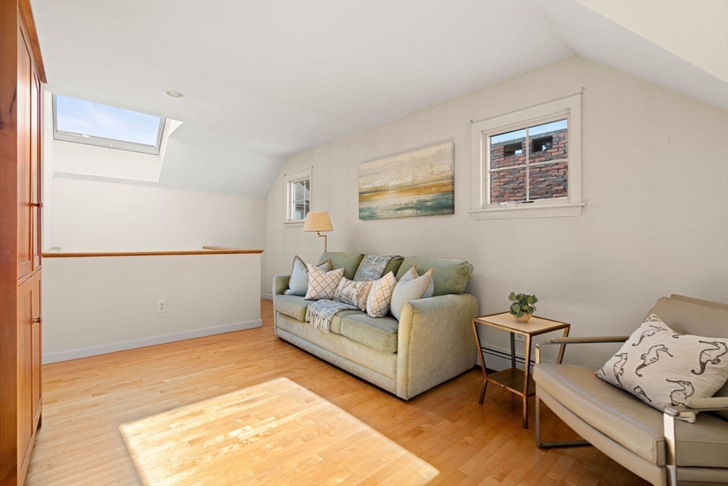 153 Jersey Street Marblehead, MA 01945 - Photo 22 of 34 a living room with furniture and a couch