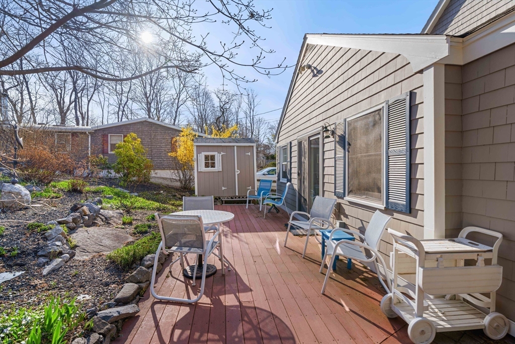 153 Jersey Street Marblehead, MA 01945 - Photo 30 of 34 a view of a patio with table and chairs and potted plants