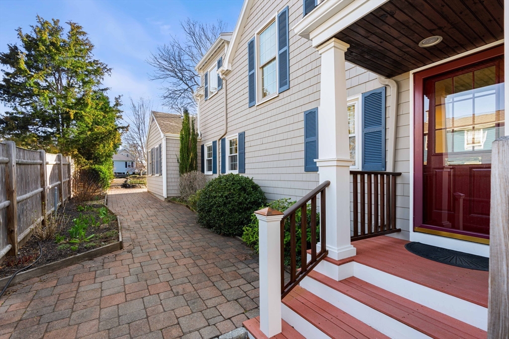 153 Jersey Street Marblehead, MA 01945 - Photo 3 of 34 a view of a porch with plants and large tree