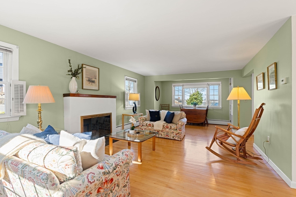 153 Jersey Street Marblehead, MA 01945 - Photo 7 of 34 a living room with furniture and a fireplace