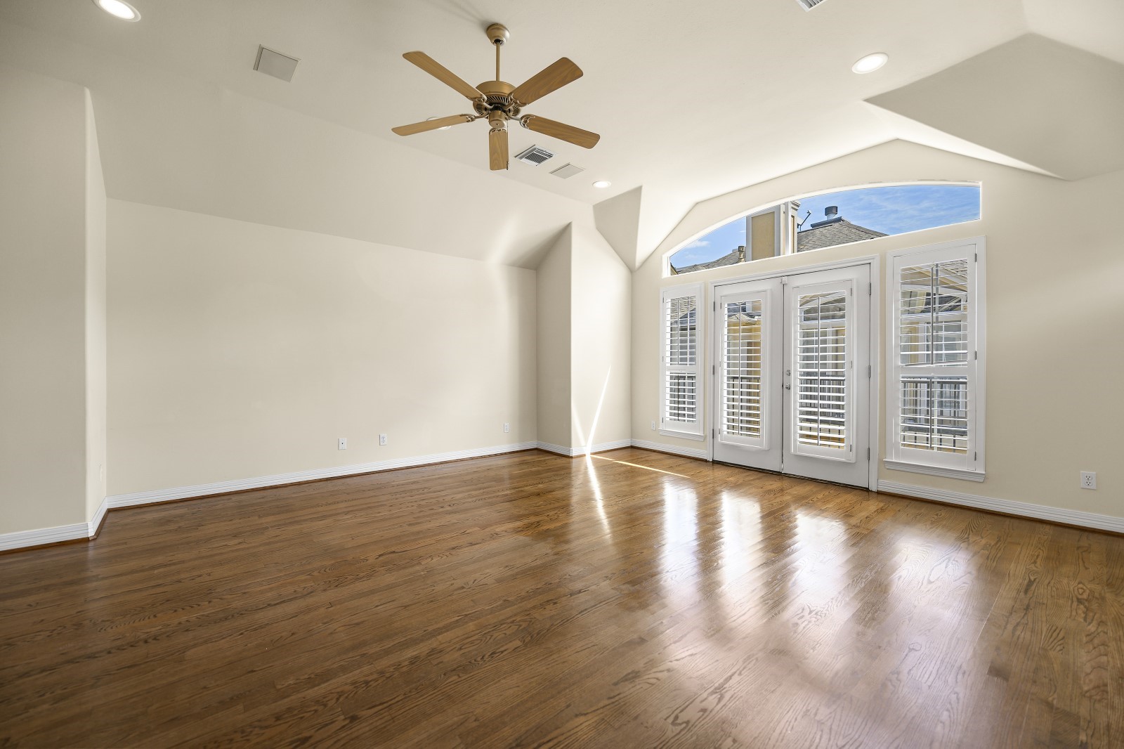 3307 West Lamar Street, Unit B Houston, TX 77019 - Photo 14 of 27 a view of an empty room with wooden floor and a window