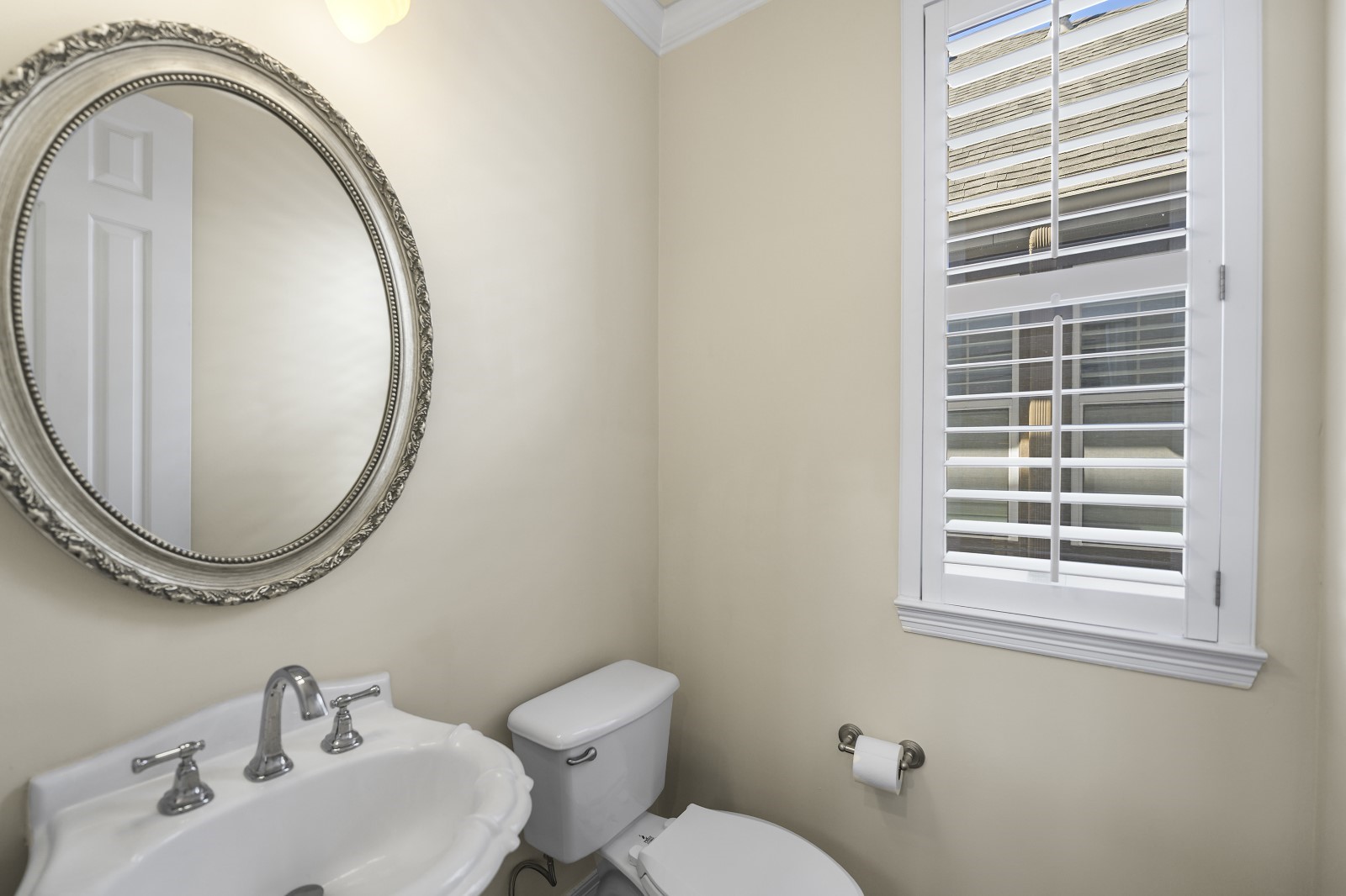 3307 West Lamar Street, Unit B Houston, TX 77019 - Photo 20 of 27 a bathroom with a sink mirror and toilet