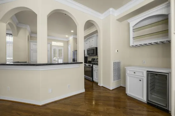 a view of a kitchen with a sink