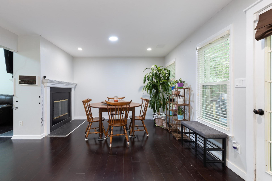 5006 Greenview Drive Durham, NC 27713 - Photo 13 of 34 a dining room with furniture and wooden floor