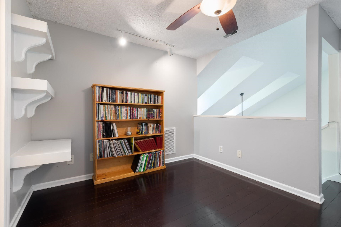 5006 Greenview Drive Durham, NC 27713 - Photo 22 of 34 a view of a workspace with furniture and wooden floor