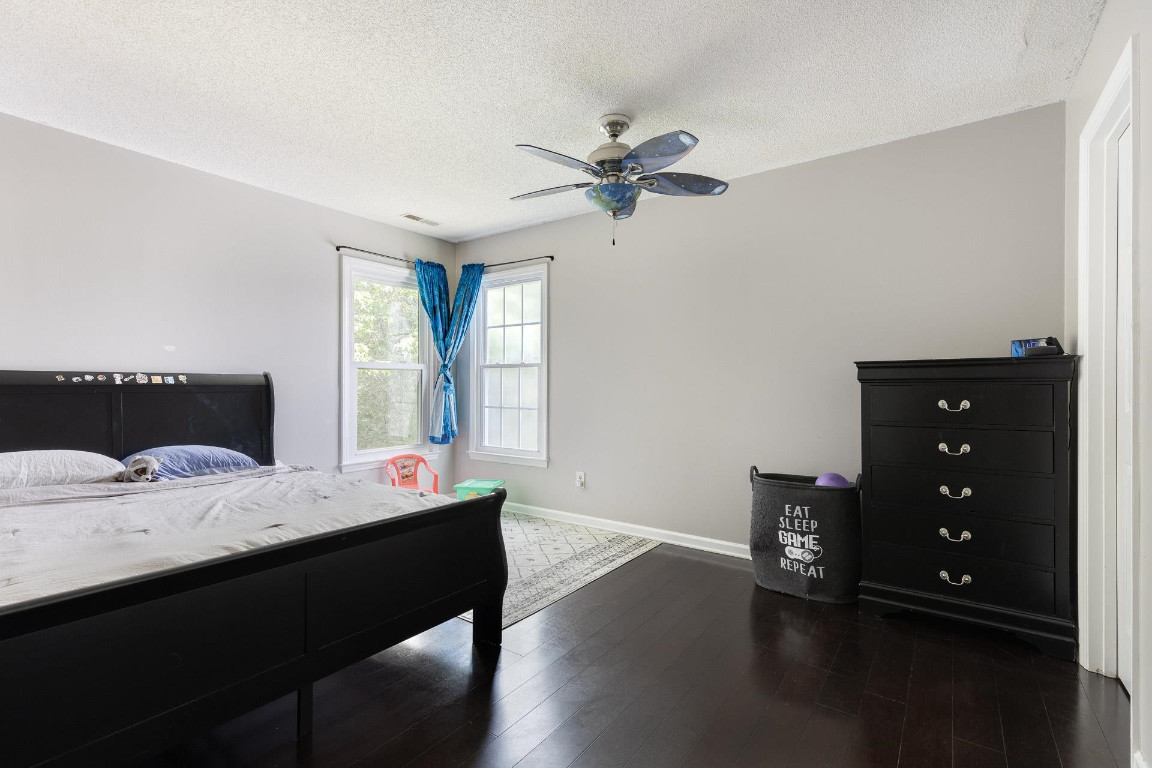 5006 Greenview Drive Durham, NC 27713 - Photo 27 of 34 a room with a bed and a window