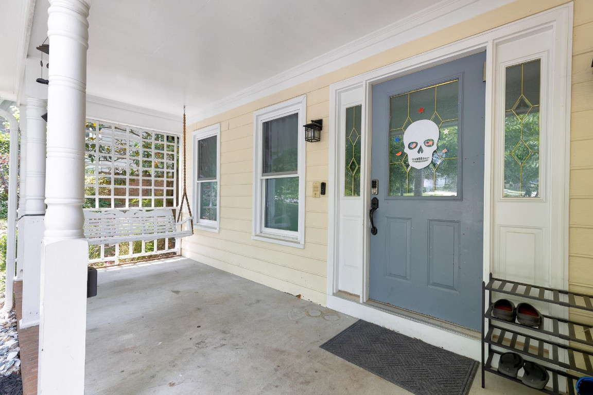 5006 Greenview Drive Durham, NC 27713 - Photo 3 of 34 an empty room with windows
