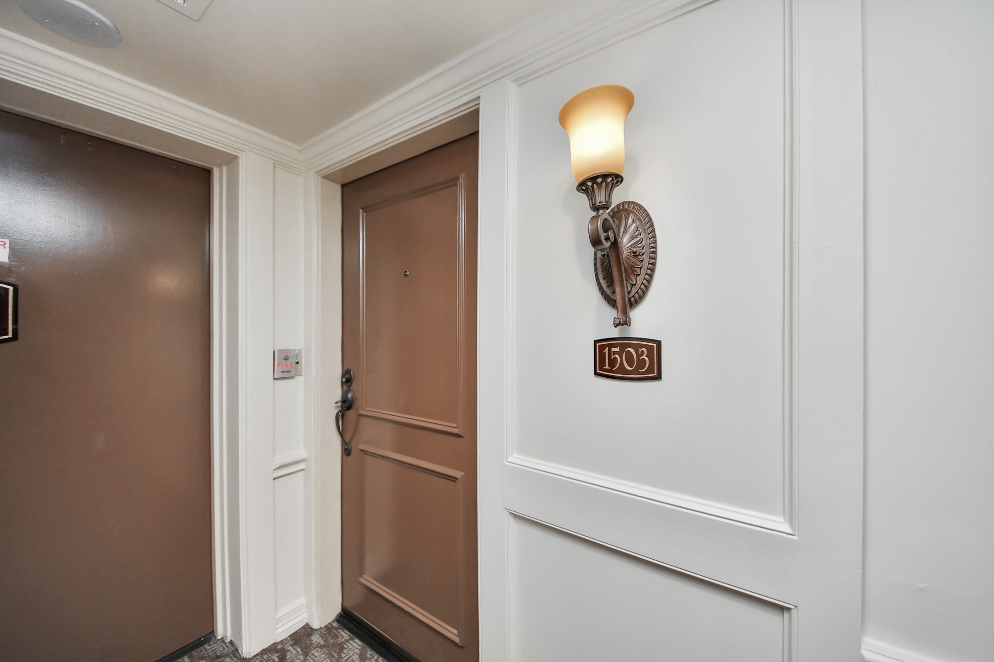 3525 Sage Road, Unit 1503 Houston, TX 77056 - Photo 19 of 50 a view of entryway with wooden floor