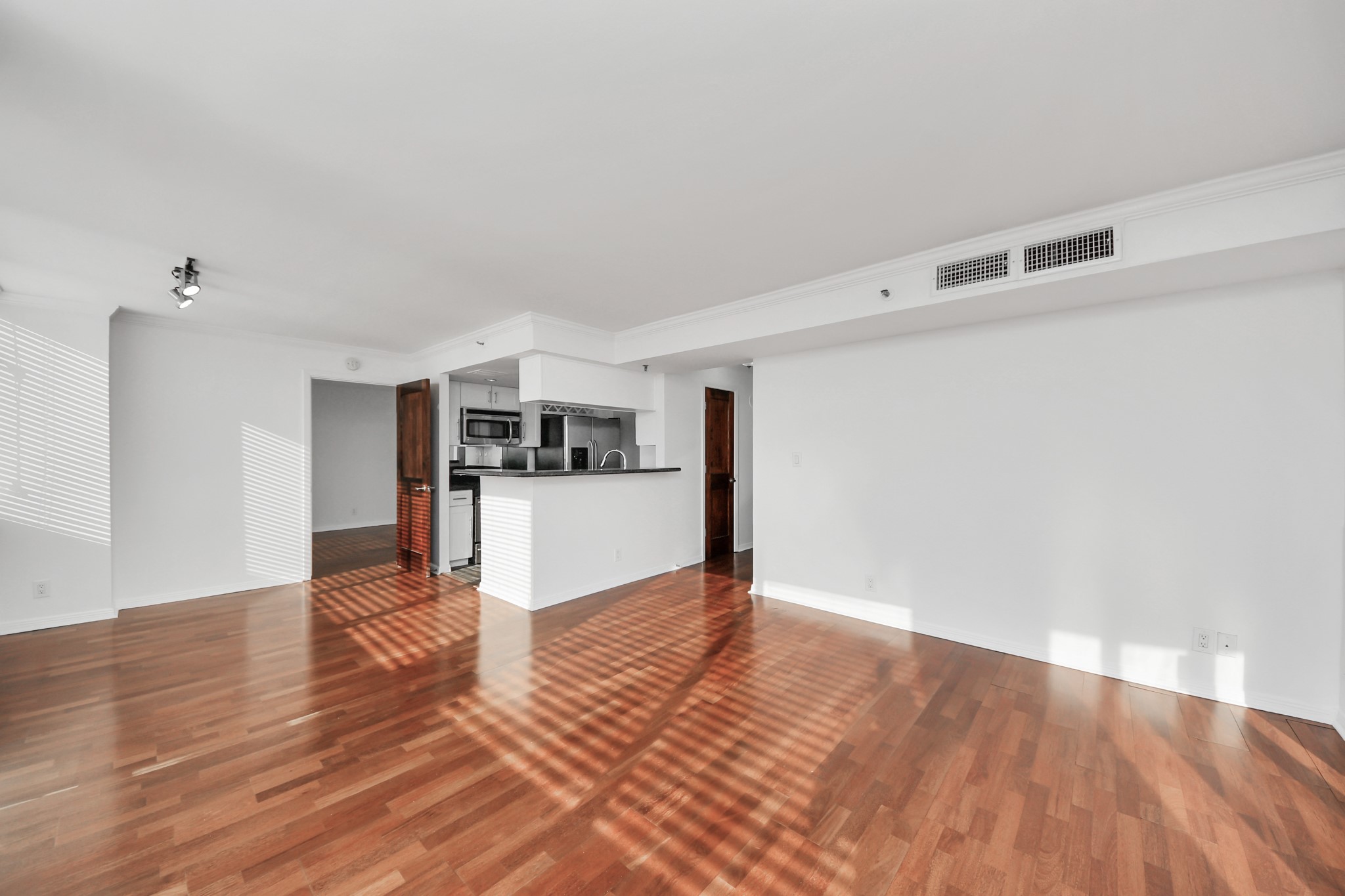 3525 Sage Road, Unit 1503 Houston, TX 77056 - Photo 26 of 50 a view of empty room with wooden floor