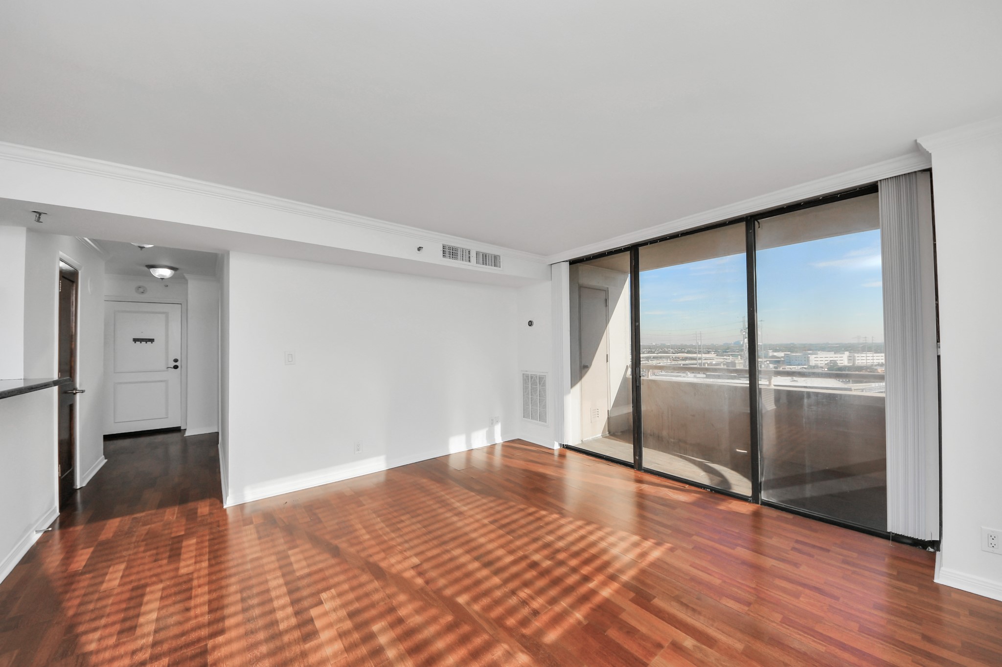 3525 Sage Road, Unit 1503 Houston, TX 77056 - Photo 27 of 50 a view of empty room with wooden floor