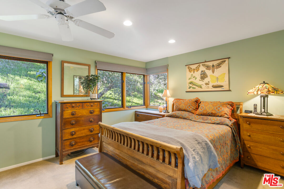 3217 Canon Place Topanga, CA 90290 - Photo 13 of 49 a bedroom with a bed and a window