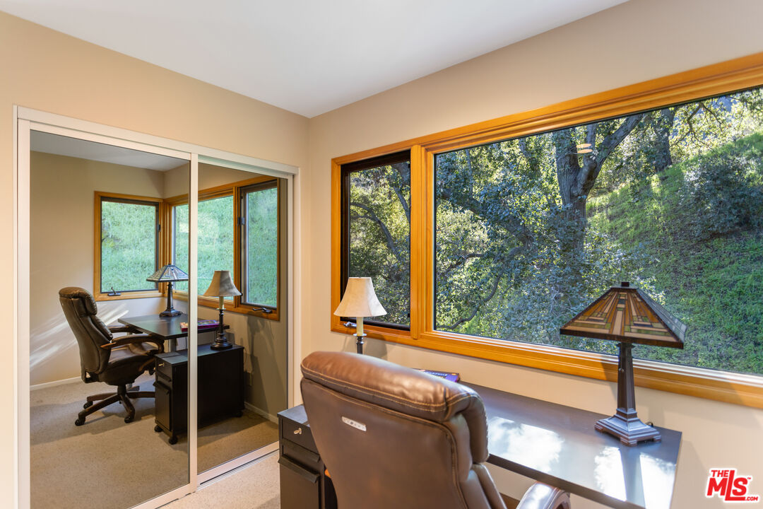 3217 Canon Place Topanga, CA 90290 - Photo 18 of 49 a room with furniture and a window