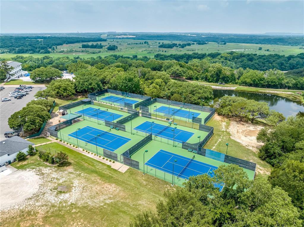 3030 West Landings Road North Granbury, TX 76049 - Photo 32 of 33 a view of an outdoor space yard lake and outdoor seating