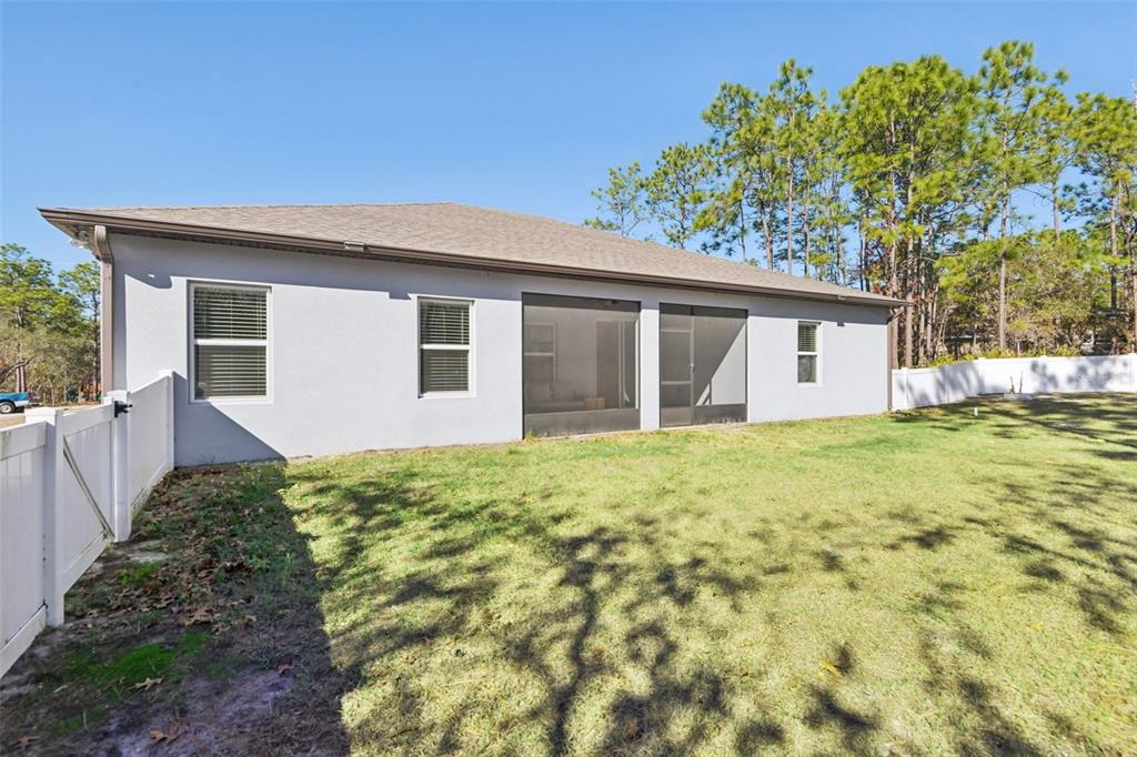 21 Mayten Court North Homosassa, FL 34446 - Photo 27 of 37 a view of a house with a yard